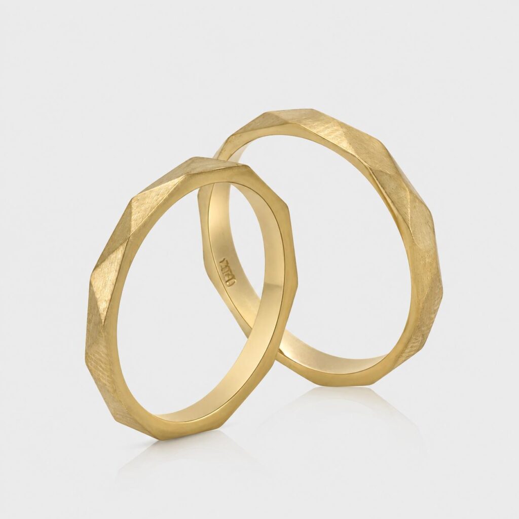 The Modern Faceted Gold Wedding Band