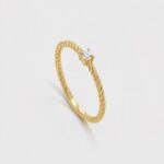 Delicate Twisted Gold Ring with Diamond
