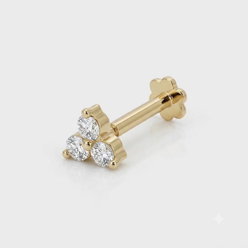 The Trilogy Diamond Cluster Gold Piercing
