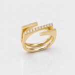 Open ring with fingerprints and diamonds